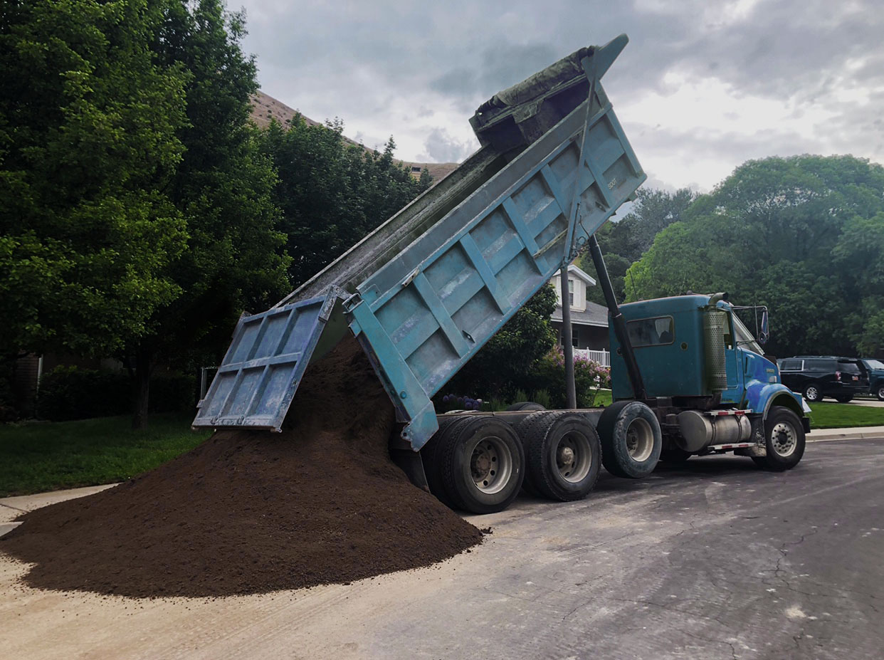 Topsoil delivery truck